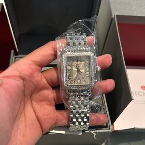 A Michele watch with diamonds.